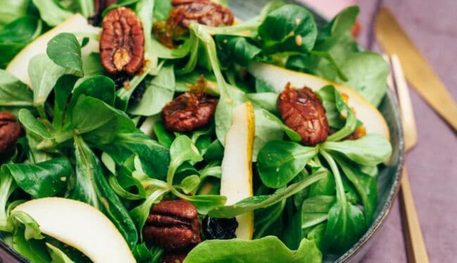 Pear salad with caramelized pecans and dried cherries recipe