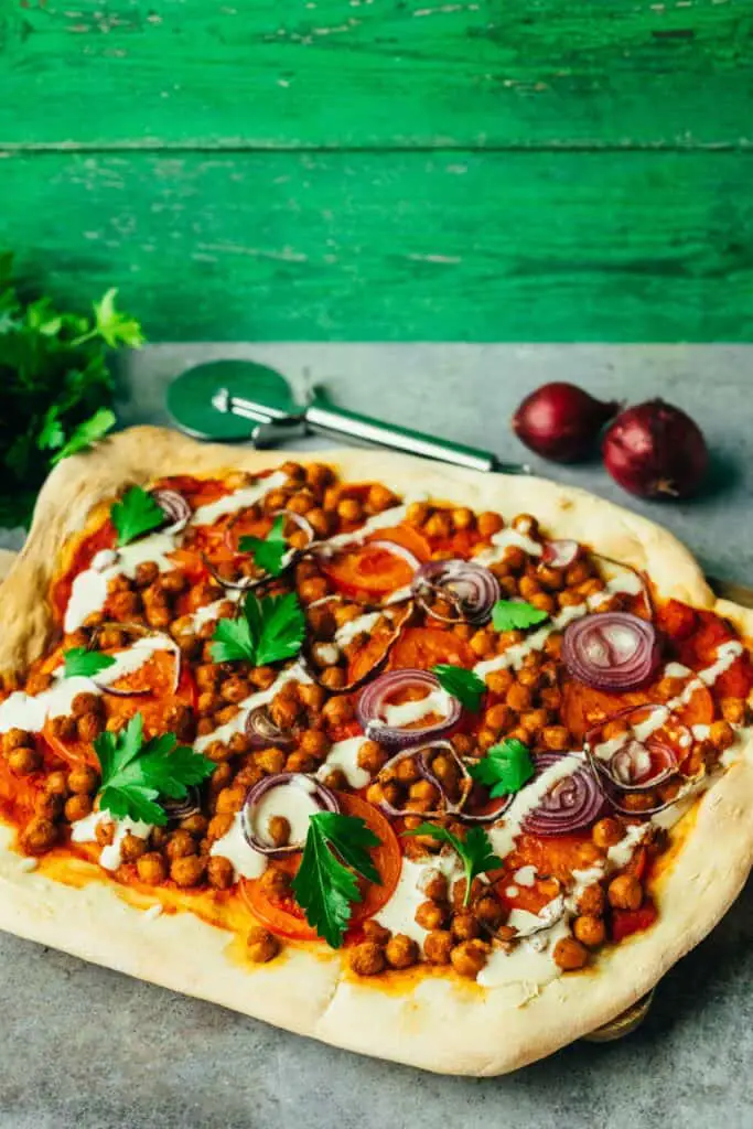 Berbere spelt pizza with tahini dressing