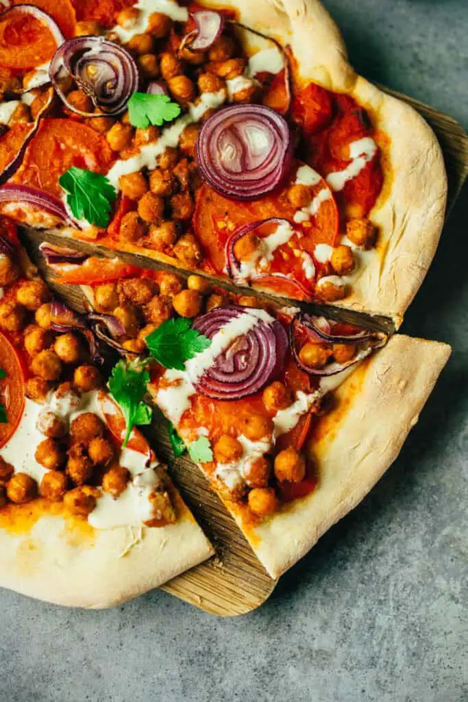 Berbere spelt pizza with tahini dressing