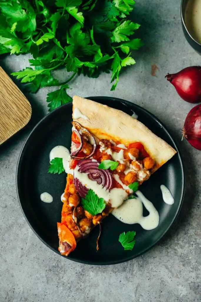 Berbere spelt pizza with tahini dressing