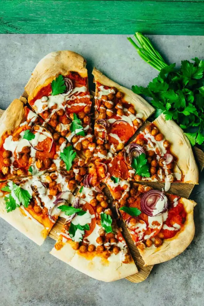 Berbere spelt pizza with tahini dressing