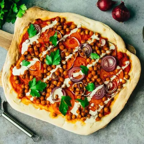 Berbere spelt pizza with tahini dressing