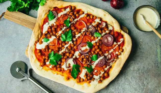 Berbere spelt pizza with tahini dressing