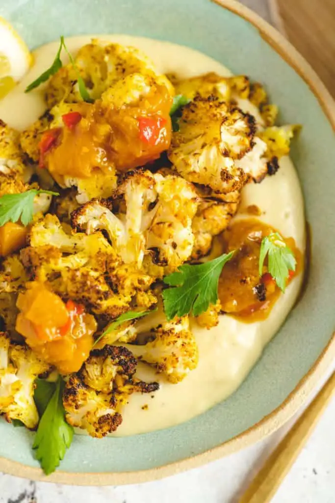 Roasted cauliflower on mashed potatoes and mango chutney