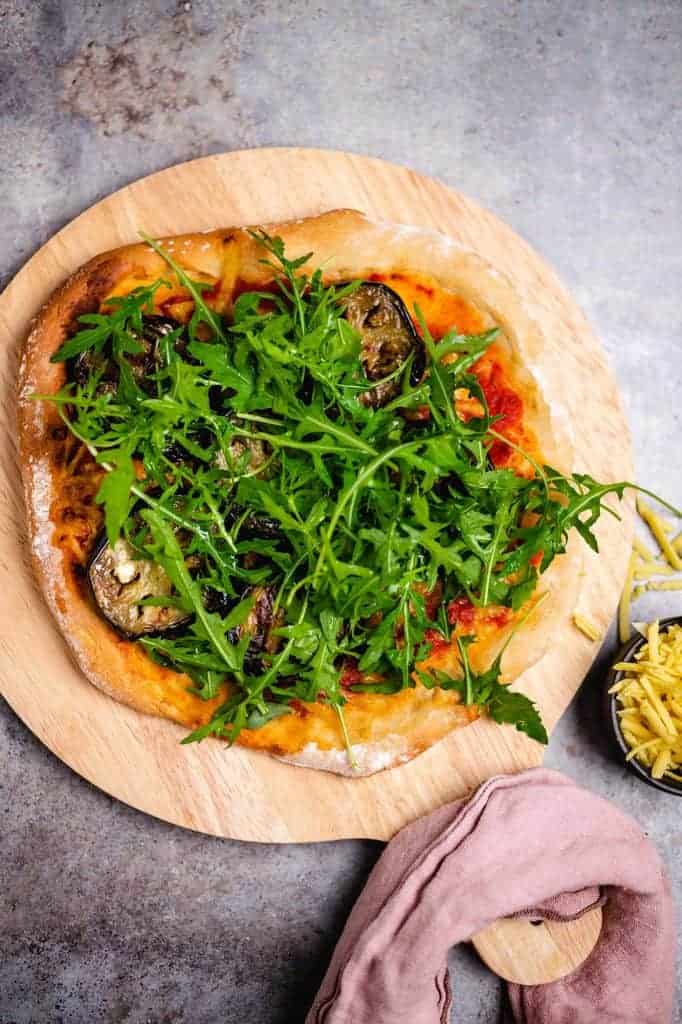 Pizza with grilled eggplant and arugula  