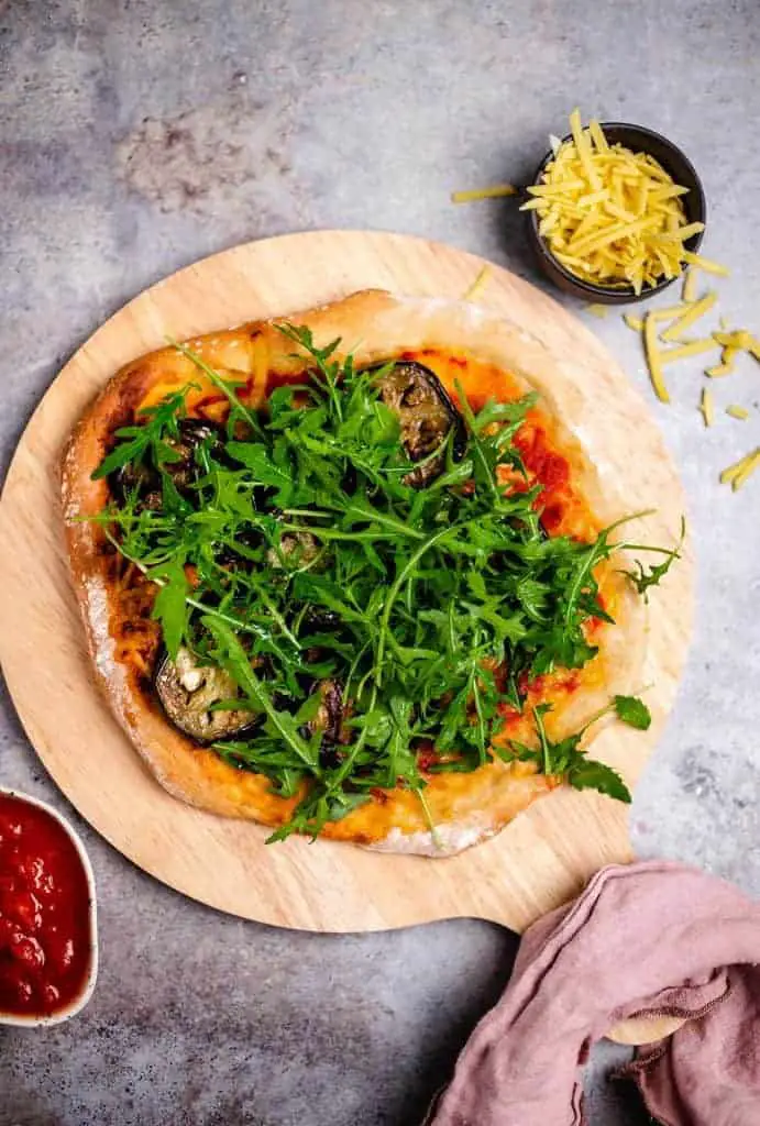 Pizza with grilled eggplant and arugula