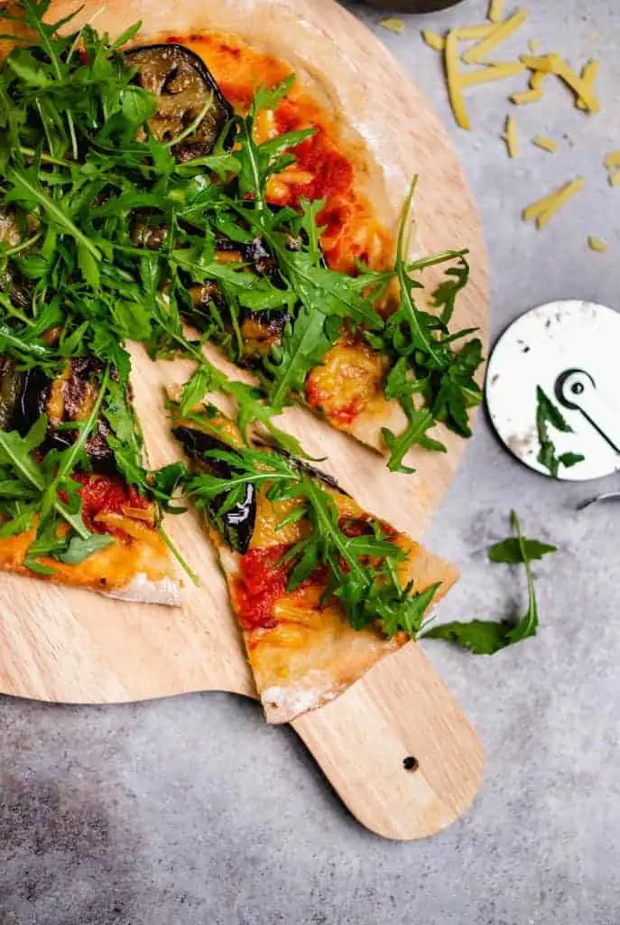 Pizza with grilled eggplant and arugula