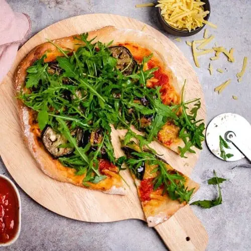 Pizza with grilled eggplant and arugula