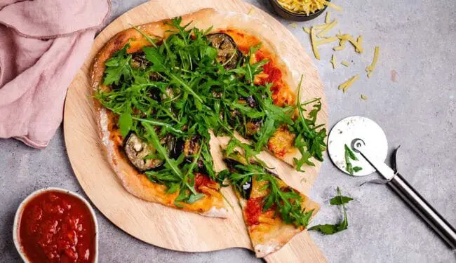 Pizza with grilled eggplant and arugula