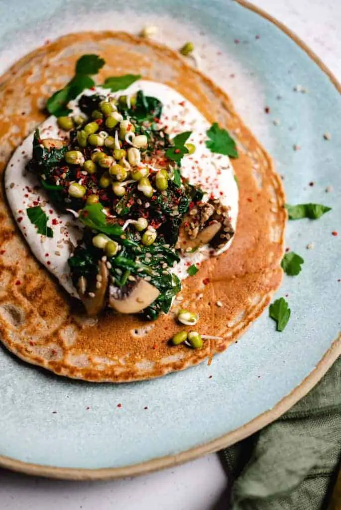 Buckwheat crêpes with spinach and mushrooms