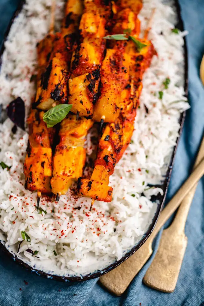 Grilled tofu pineapple skewers on rice