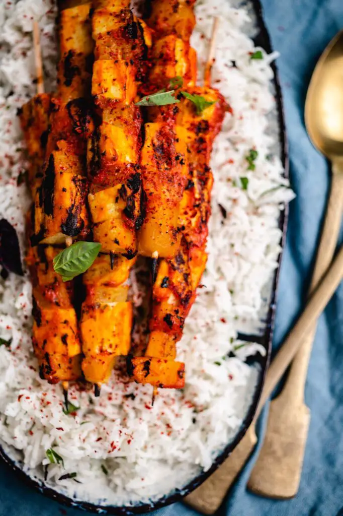 Grilled tofu pineapple skewers on rice