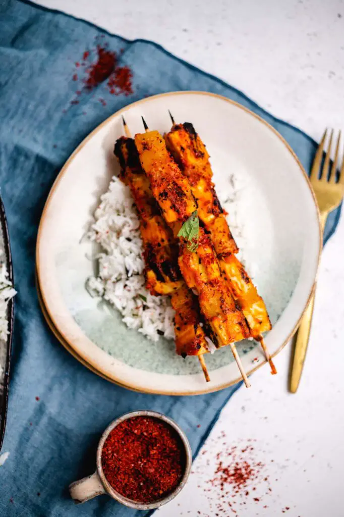 Grilled tofu pineapple skewers on rice