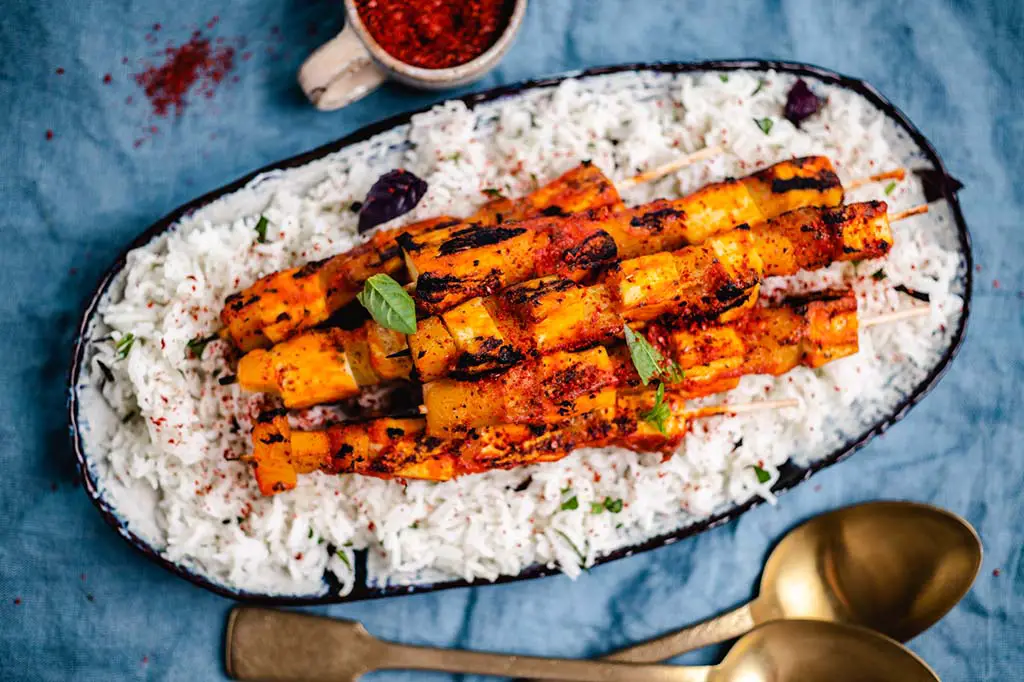 Grilled tofu pineapple skewers on rice