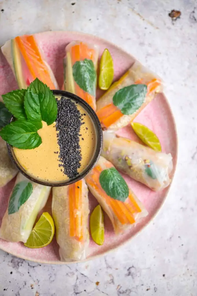 Vegan summer rolls with alfalfa sprouts and cashew sauce