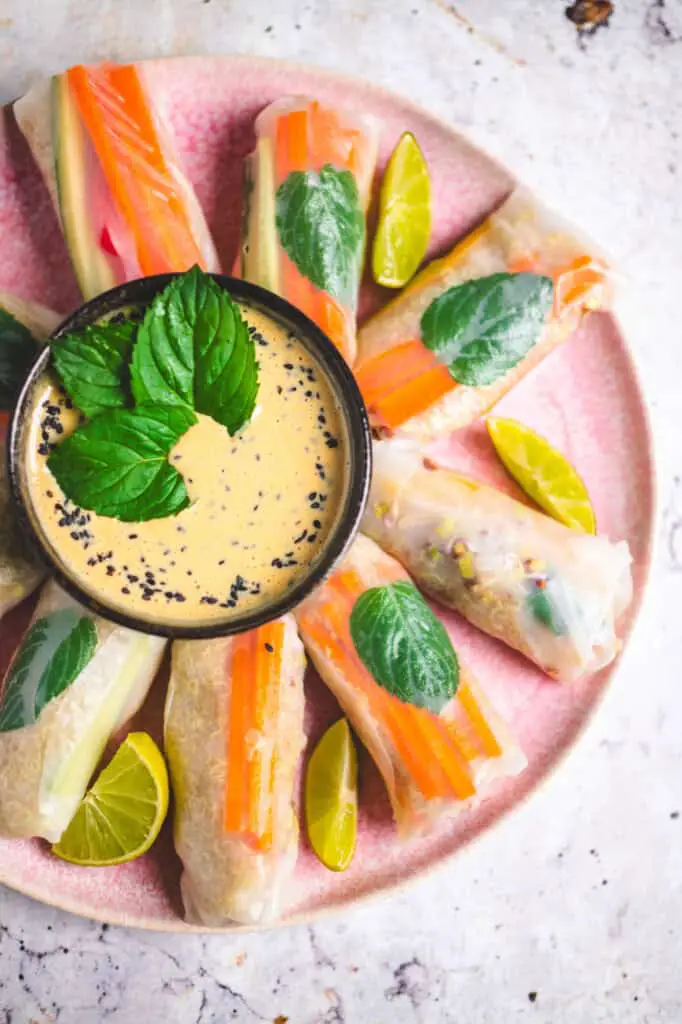 Vegan summer rolls with alfalfa sprouts and cashew sauce